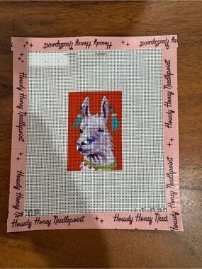 Colorful alpaca needlepoint and disco ball needle minder